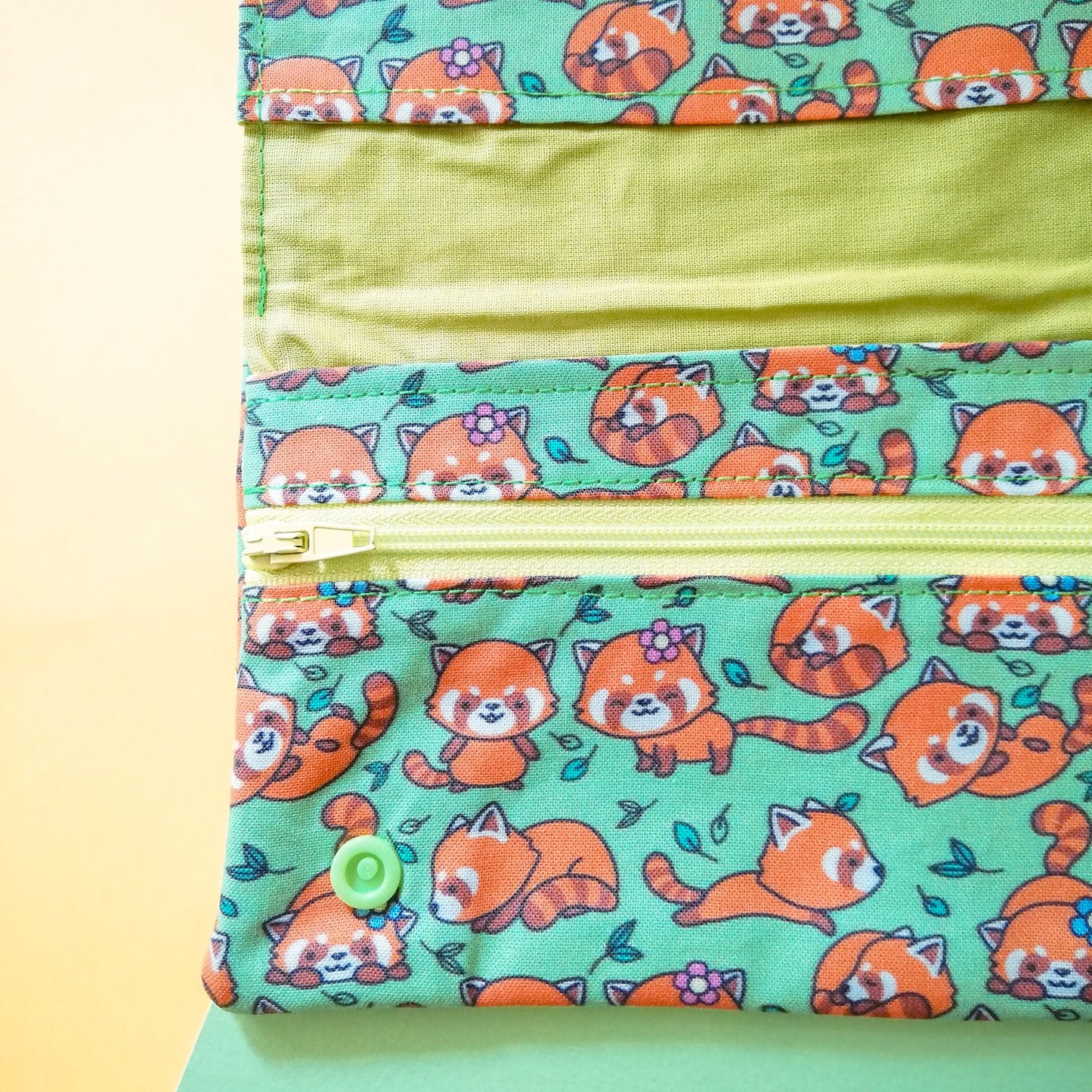 Porta documenti "Panda rossi sui prati"