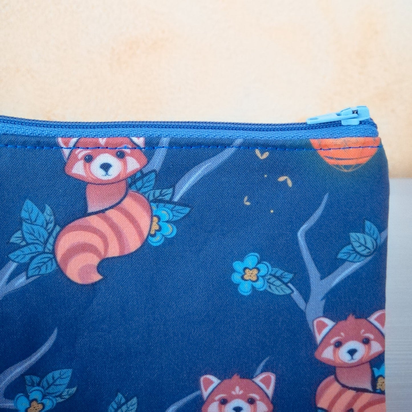 Portamonete "Panda rossi sugli alberi"