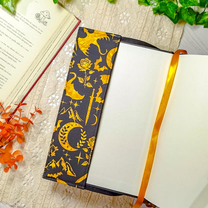 Book cover "Draghi dorati" | Custodia per libri regolabile