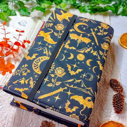 Book cover "Draghi dorati" | Custodia per libri regolabile