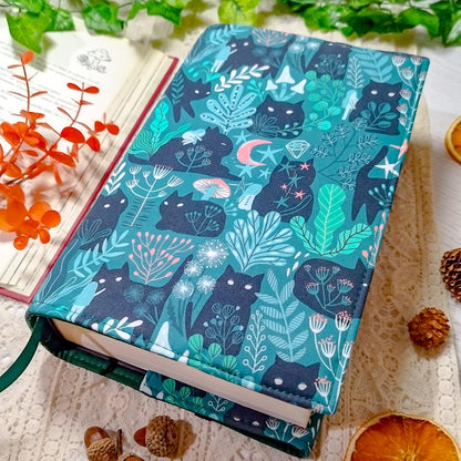 Book cover "Gatti neri nel bosco" | Custodia per libri regolabile