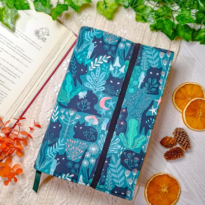 Book cover "Gatti neri nel bosco" | Custodia per libri regolabile