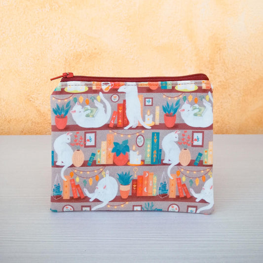 Portamonete "Gatti in libreria beige"