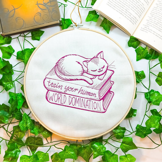 Decoro da parete a tema lettura "Gatto train your human"